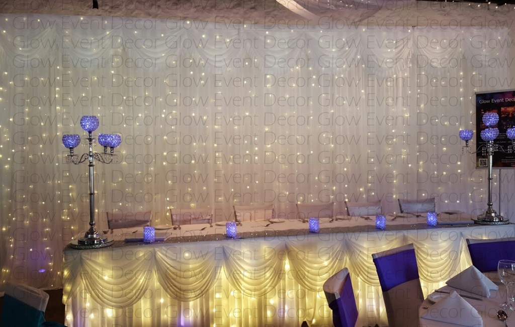6m swagged wedding bridal table backdrop with fairy lights 5 arm crystal ball LED cup t lite chrome candelabra hire Adelaide South Australia Glow Event Decor