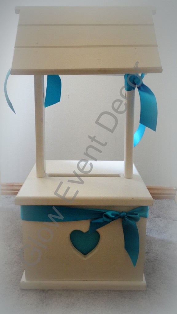 Large white wooden wishing well for hire from glow event decor